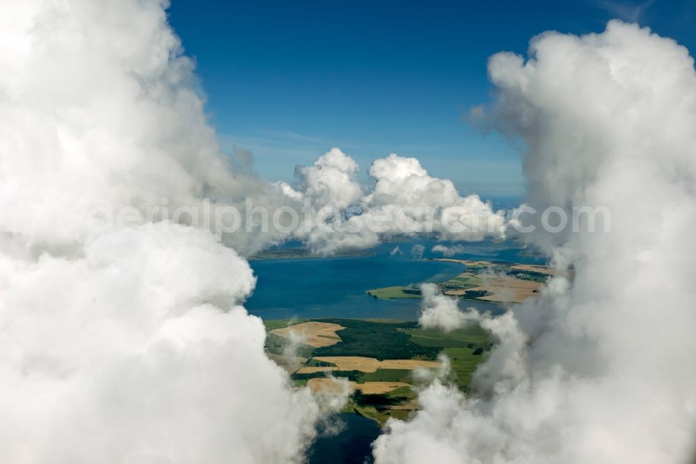 Ummanz from above - Towering cumulus cloud formation off the Baltic coast Ummanz on Rügen in Mecklenburg-Western Pomerania