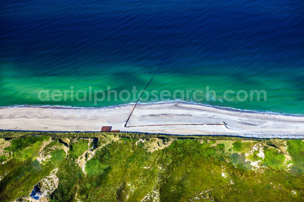 Sylt from the bird's eye view: Backfill and soil consolidation work on the dune area of the sandy beach landscape along the coastline Strandaufspuelung on street Am Sandwall in Sylt at the North Sea in the state Schleswig-Holstein, Germany