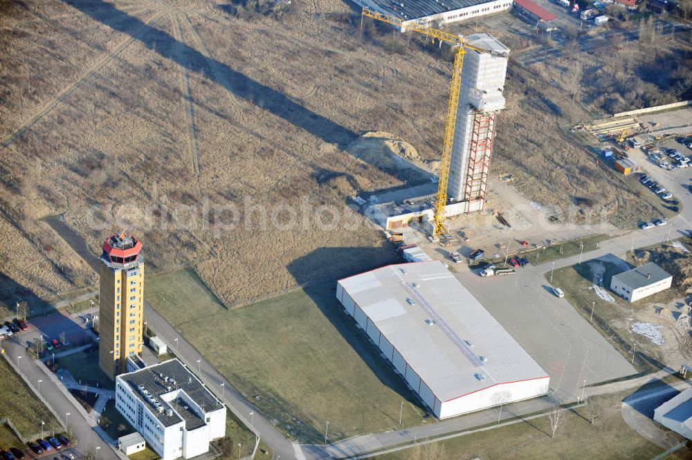 Schönefeld from the bird's eye view: Constrution site of ASR - radar- tower at the airport Berlin Schönefeld international