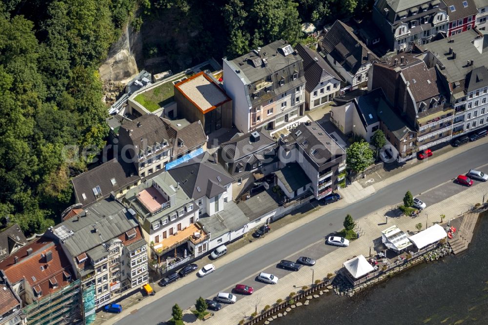 Altena from the bird's eye view: The building with the lift of Altena castle in the state North Rhine-Westphalia. It is located in the Lennestrasse near the Lenneuferstrasse on the foot of the mountainside of Altena castle. The lift is a tourist attraction