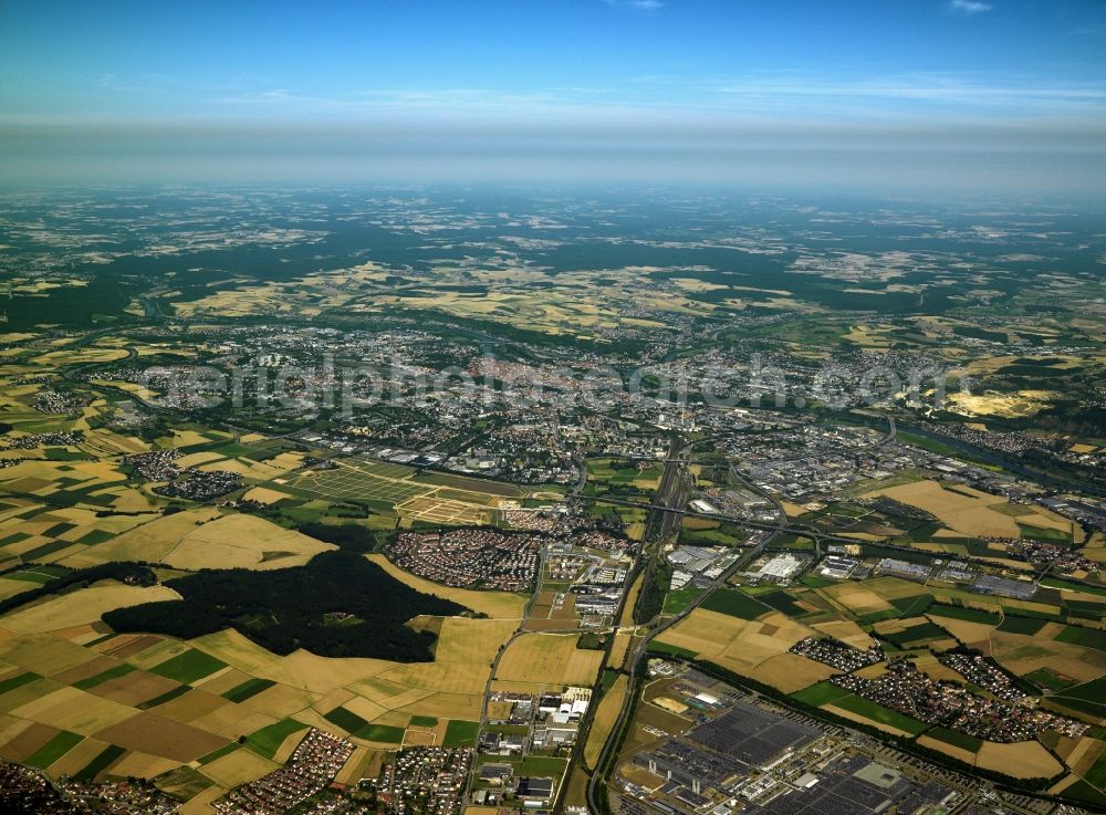 Aerial image Augsburg - Augsburg and its surrounding landscape in the state of Bavaria. The university town is seat of the government of Swabia and its district. It became a city and metropolitan region in 1909 and is today the third largest city of Bavaria with 270 000 inhabitants. The urban area of Augsburg is part of the larger region of Augsburg with 830 000 inhabitants. It is located on the rivers Lech and Wertach and borders the landscape of Lechfeld in the South and the Nature park Augsburg-Western Forests