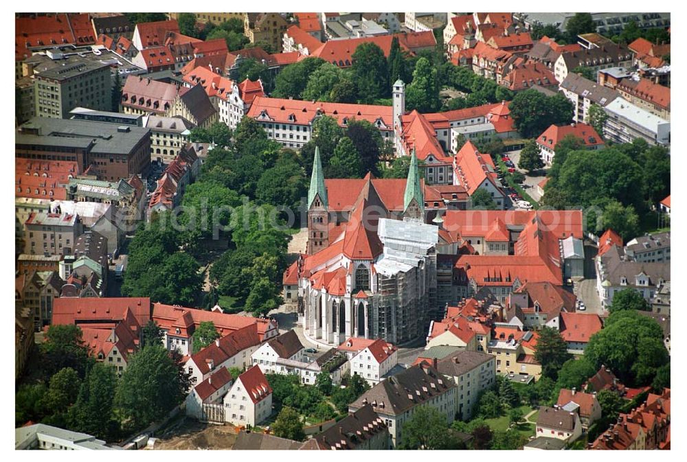 Augsburg / Bayern from the bird's eye view: 12.07.2005 Augsburg (Bayern) Augsburgs Dom: Holbein-Altar und Prophetenfenster So lange wie die Geschichte des Augsburger Doms ist die Reihe der hier tätigen Künstler. Der Dom „Mariä Heimsuchung“ stammt im Kern noch aus dem 10. Jahrhundert, die beiden mächtigen Domtürme wurden im 11. Jahrhundert errichtet. Berühmt sind die „Prophetenfenster“ aus dem 12. Jahrhundert.