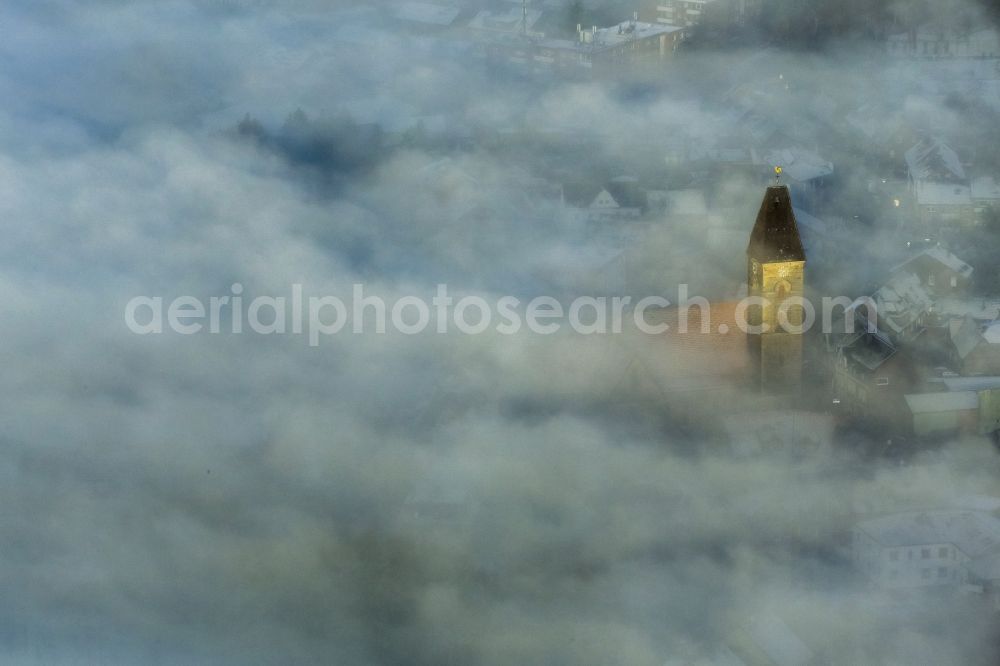 Aerial photograph Hamm - From the fog cloud cover outstanding spire of the Protestant Church in Paul Hamm in North Rhine-Westphalia