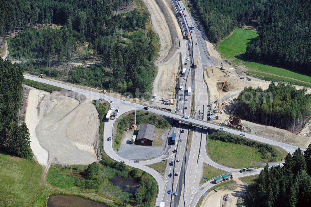 Aerial photograph Dittersdorf - Buildings and route of the motorway A9 motorway with four lanes now. Currently, reconstruction, expansion and new construction work is underway for the six-lane expansion of Highway 9 between Triptis and Schleiz by Wayss & Freytag Ingenieurbau and EUROVIA VINCI