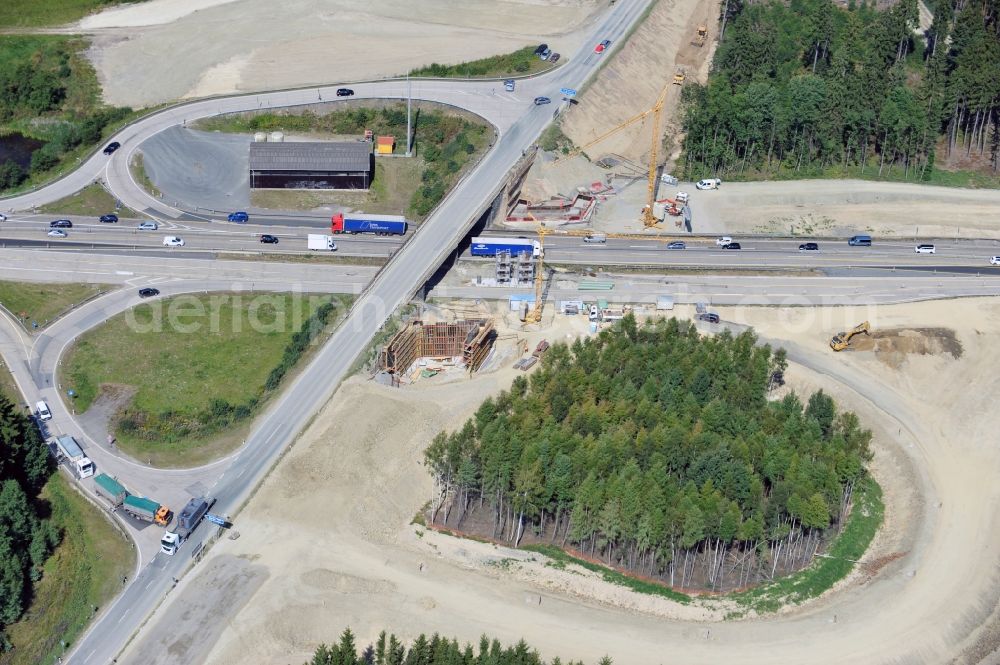 Aerial photograph Dittersdorf - Buildings and route of the motorway A9 motorway with four lanes now. Currently, reconstruction, expansion and new construction work is underway for the six-lane expansion of Highway 9 between Triptis and Schleiz by Wayss & Freytag Ingenieurbau and EUROVIA VINCI