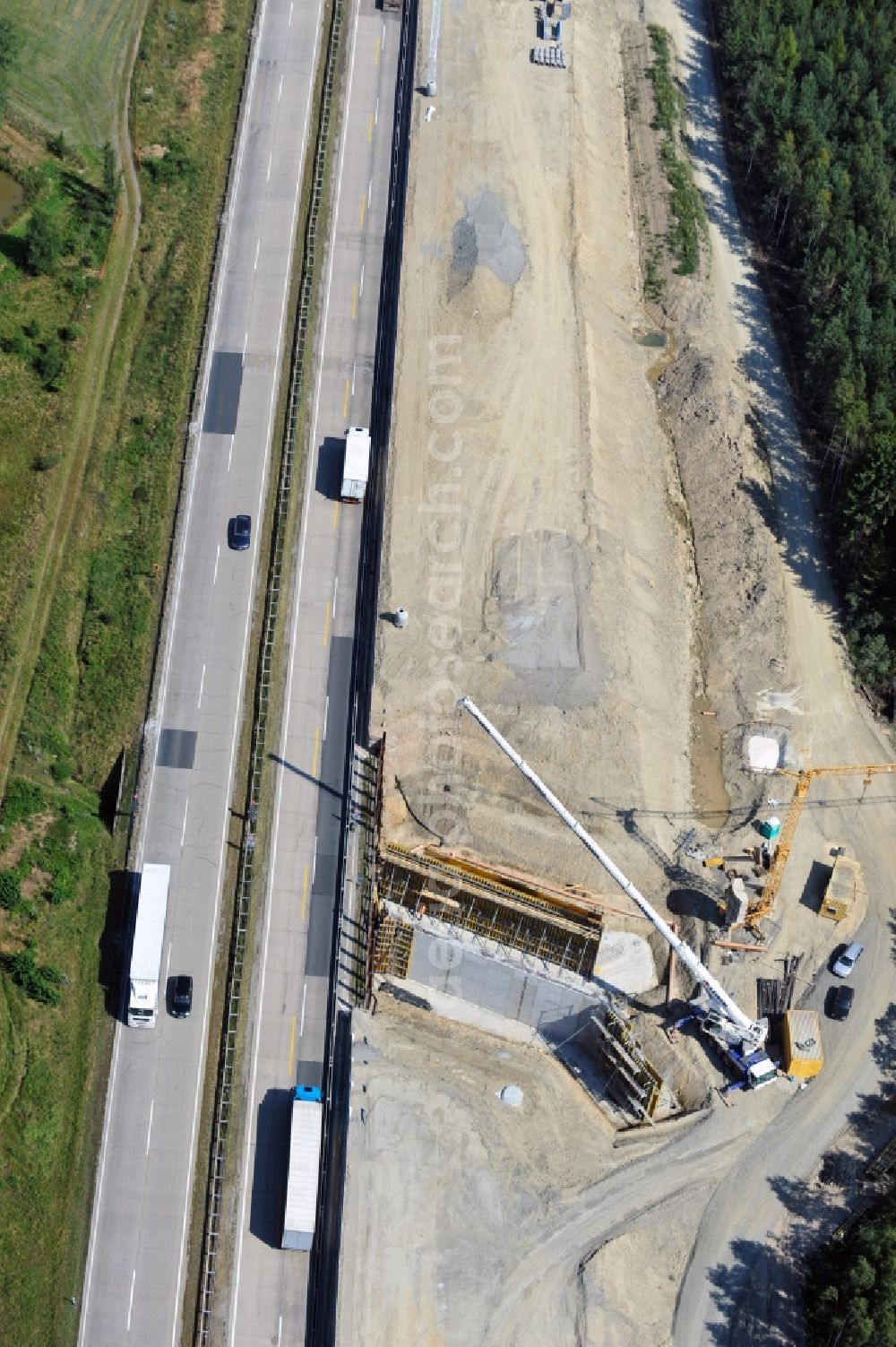 Aerial photograph Dittersdorf - Buildings and route of the motorway A9 motorway with four lanes now. Currently, reconstruction, expansion and new construction work is underway for the six-lane expansion of Highway 9 between Triptis and Schleiz by Wayss & Freytag Ingenieurbau and EUROVIA VINCI