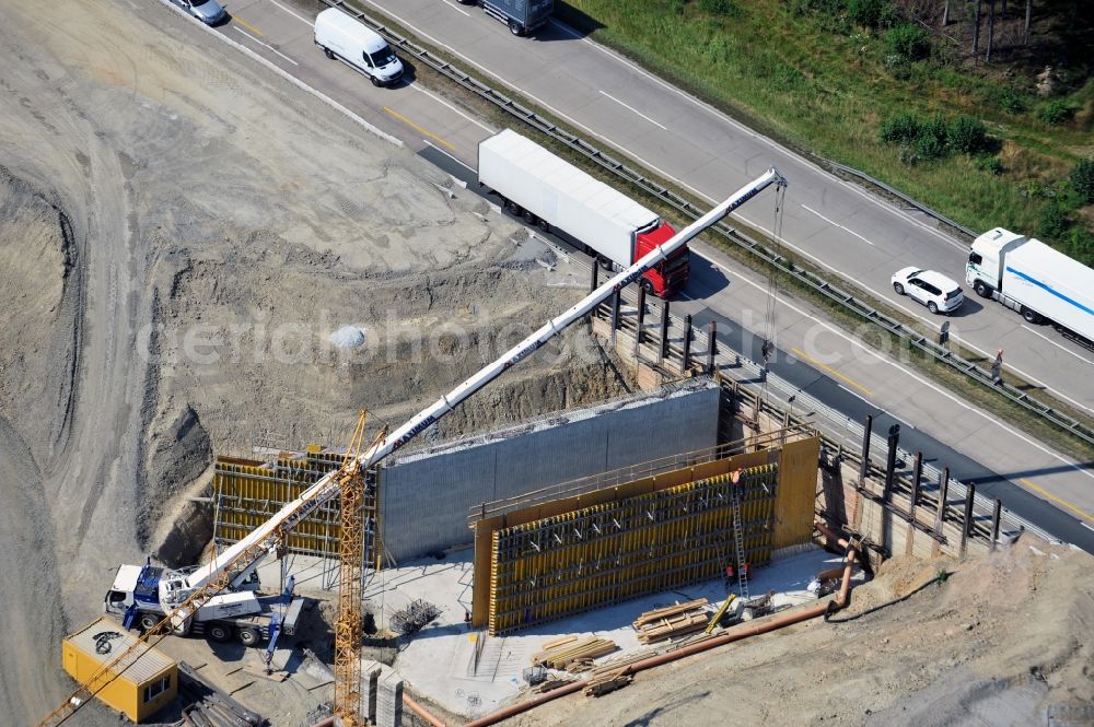 Dittersdorf from above - Buildings and route of the motorway A9 motorway with four lanes now. Currently, reconstruction, expansion and new construction work is underway for the six-lane expansion of Highway 9 between Triptis and Schleiz by Wayss & Freytag Ingenieurbau and EUROVIA VINCI