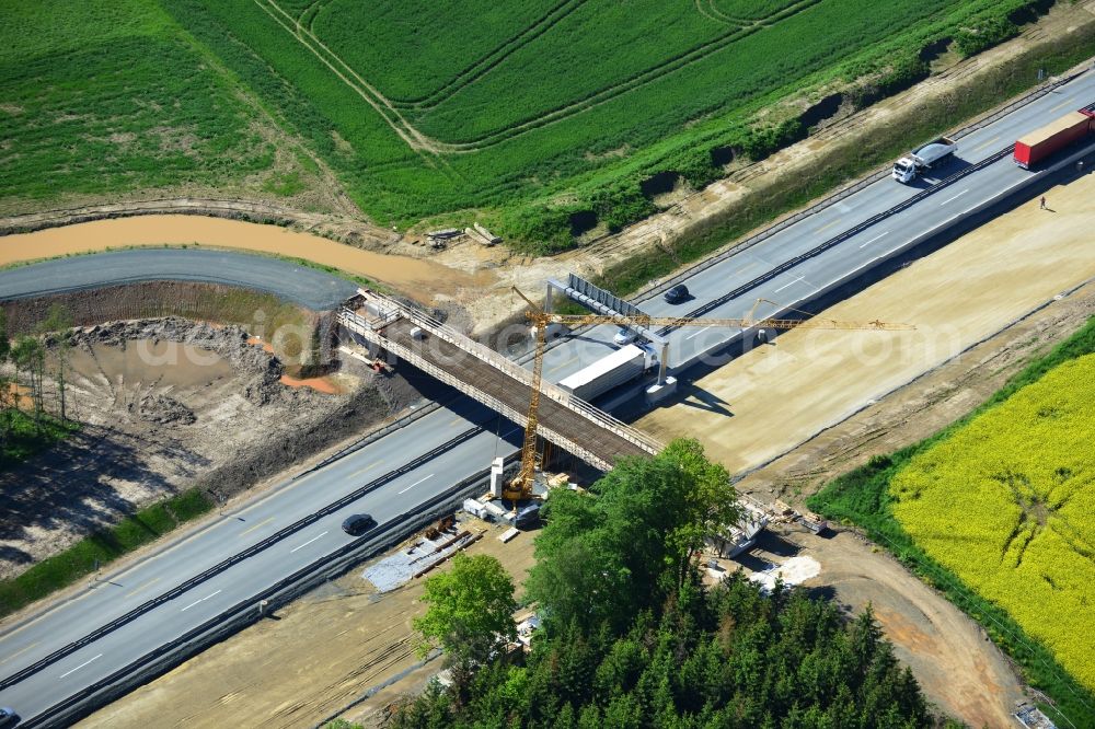 Aerial image Dittersdorf - Buildings and route of the motorway A9 motorway with four lanes now. Currently, reconstruction, expansion and new construction work is underway for the six-lane expansion of Highway 9 between Triptis and Schleiz by Wayss & Freytag Ingenieurbau and EUROVIA VINCI