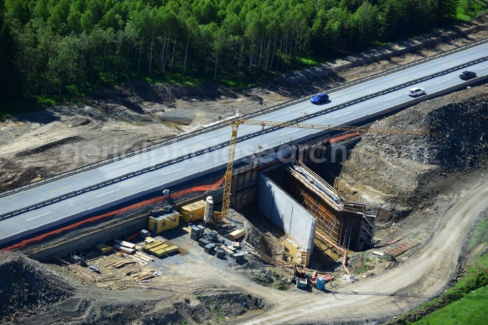 Aerial photograph Dittersdorf - Buildings and route of the motorway A9 motorway with four lanes now. Currently, reconstruction, expansion and new construction work is underway for the six-lane expansion of Highway 9 between Triptis and Schleiz by Wayss & Freytag Ingenieurbau and EUROVIA VINCI