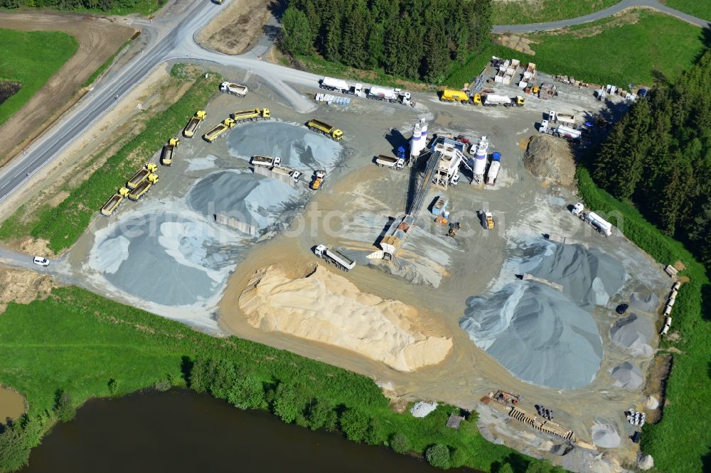 Aerial photograph Dittersdorf - Buildings and route of the motorway A9 motorway with four lanes now. Currently, reconstruction, expansion and new construction work is underway for the six-lane expansion of Highway 9 between Triptis and Schleiz by Wayss & Freytag Ingenieurbau and EUROVIA VINCI