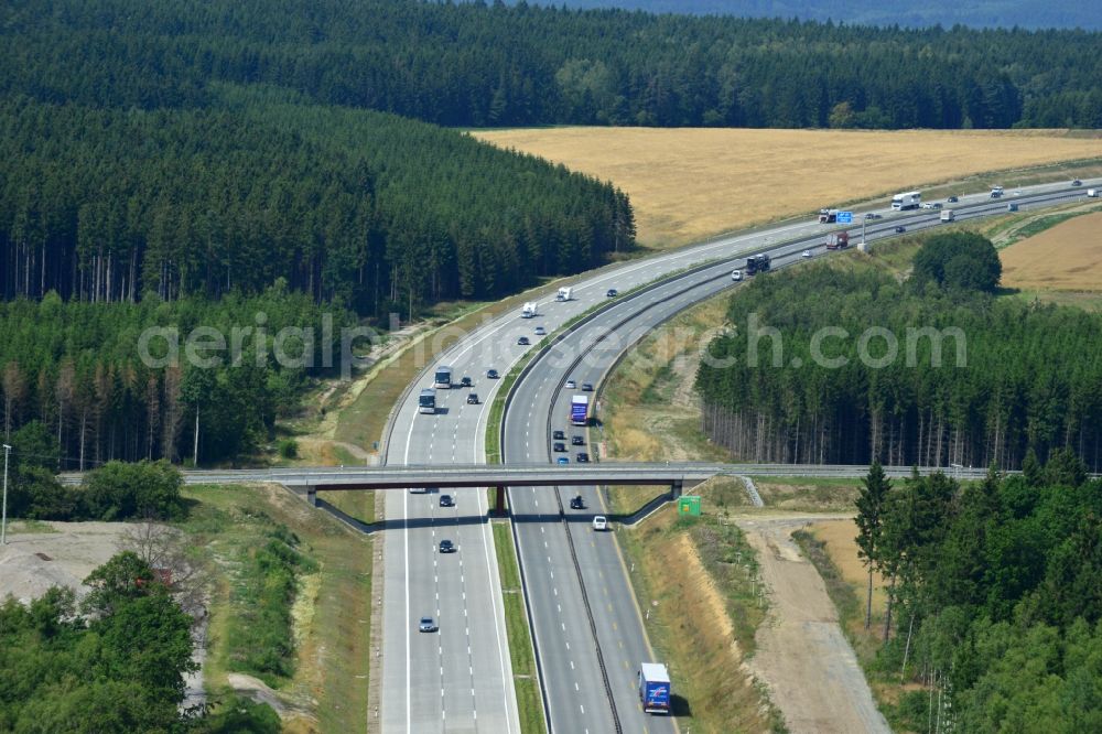 Aerial photograph Dittersdorf - Buildings and route of the motorway A9 motorway with four lanes now. Currently, reconstruction, expansion and new construction work is underway for the six-lane expansion of Highway 9 between Triptis and Schleiz by Wayss & Freytag Ingenieurbau and EUROVIA VINCI