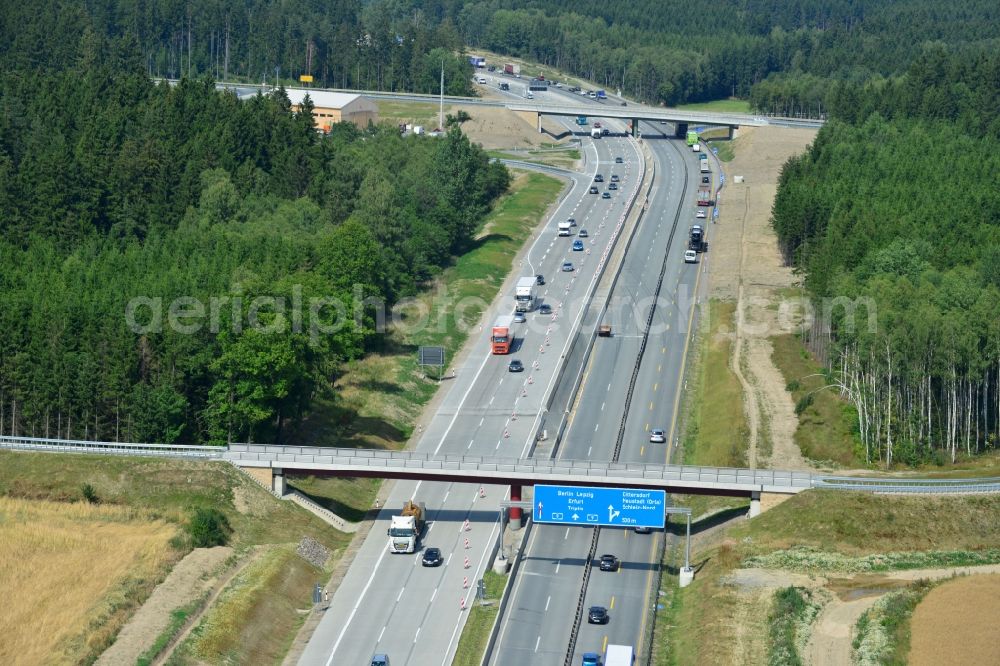 Aerial photograph Dittersdorf - Buildings and route of the motorway A9 motorway with four lanes now. Currently, reconstruction, expansion and new construction work is underway for the six-lane expansion of Highway 9 between Triptis and Schleiz by Wayss & Freytag Ingenieurbau and EUROVIA VINCI