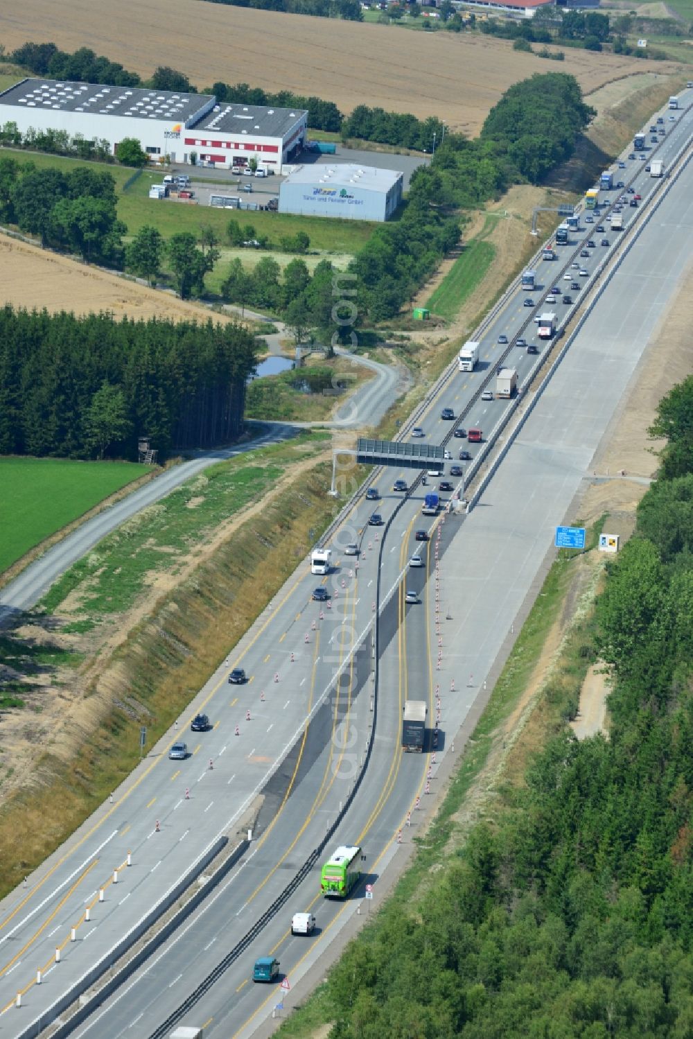 Aerial image Dittersdorf - Buildings and route of the motorway A9 motorway with four lanes now. Currently, reconstruction, expansion and new construction work is underway for the six-lane expansion of Highway 9 between Triptis and Schleiz by Wayss & Freytag Ingenieurbau and EUROVIA VINCI