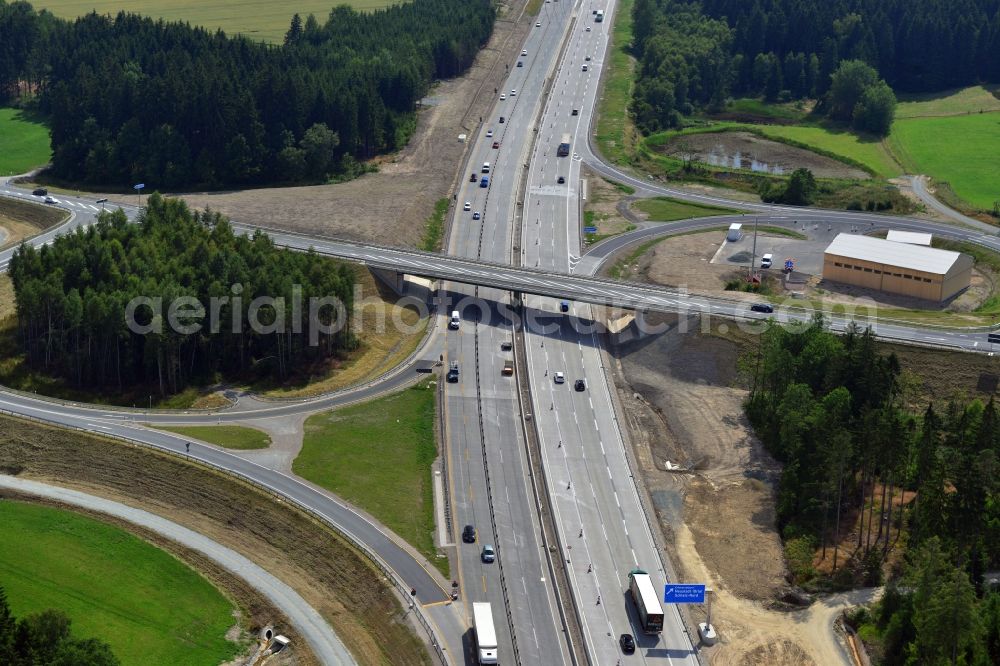 Dittersdorf from above - Buildings and route of the motorway A9 motorway with four lanes now. Currently, reconstruction, expansion and new construction work is underway for the six-lane expansion of Highway 9 between Triptis and Schleiz by Wayss & Freytag Ingenieurbau and EUROVIA VINCI