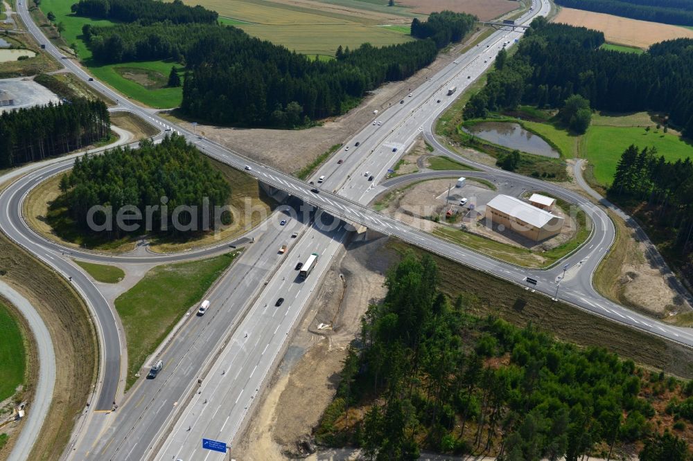 Dittersdorf from the bird's eye view: Buildings and route of the motorway A9 motorway with four lanes now. Currently, reconstruction, expansion and new construction work is underway for the six-lane expansion of Highway 9 between Triptis and Schleiz by Wayss & Freytag Ingenieurbau and EUROVIA VINCI