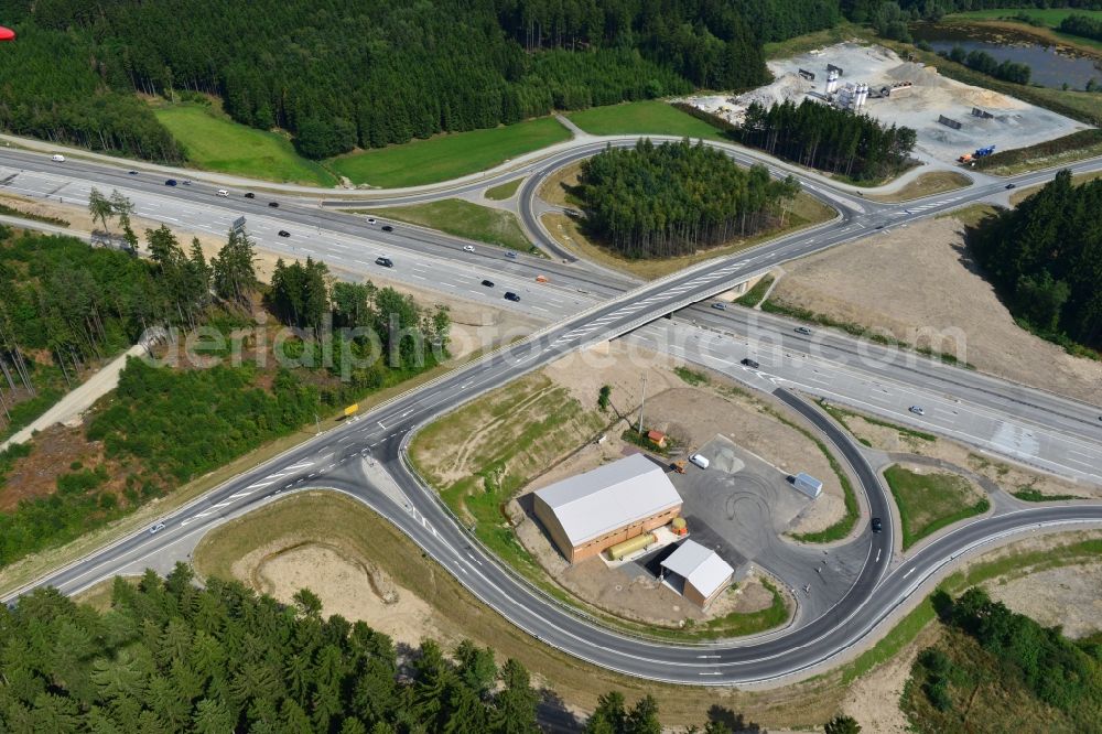 Aerial photograph Dittersdorf - Buildings and route of the motorway A9 motorway with four lanes now. Currently, reconstruction, expansion and new construction work is underway for the six-lane expansion of Highway 9 between Triptis and Schleiz by Wayss & Freytag Ingenieurbau and EUROVIA VINCI