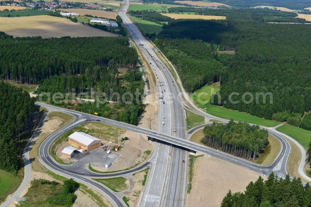 Dittersdorf from above - Buildings and route of the motorway A9 motorway with four lanes now. Currently, reconstruction, expansion and new construction work is underway for the six-lane expansion of Highway 9 between Triptis and Schleiz by Wayss & Freytag Ingenieurbau and EUROVIA VINCI