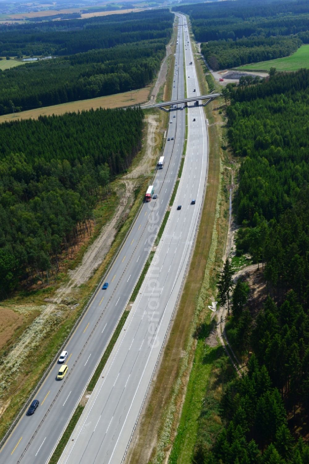 Aerial photograph Dittersdorf - Buildings and route of the motorway A9 motorway with four lanes now. Currently, reconstruction, expansion and new construction work is underway for the six-lane expansion of Highway 9 between Triptis and Schleiz by Wayss & Freytag Ingenieurbau and EUROVIA VINCI