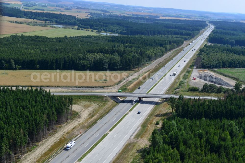 Dittersdorf from above - Buildings and route of the motorway A9 motorway with four lanes now. Currently, reconstruction, expansion and new construction work is underway for the six-lane expansion of Highway 9 between Triptis and Schleiz by Wayss & Freytag Ingenieurbau and EUROVIA VINCI