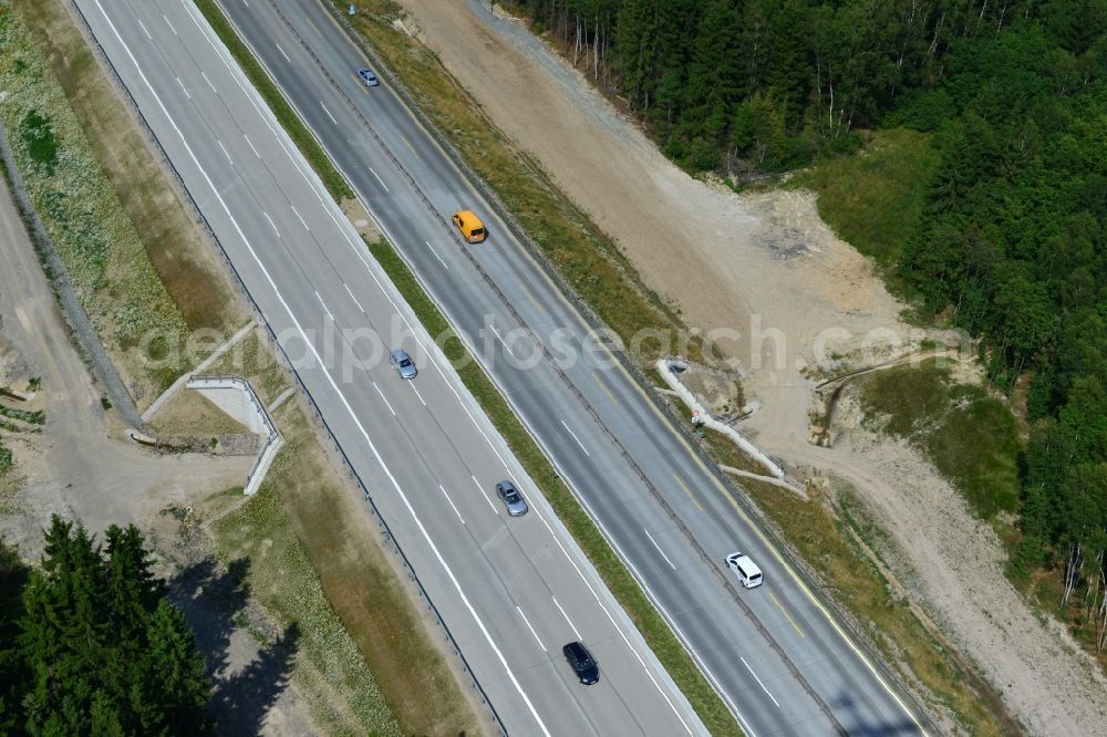 Dittersdorf from above - Buildings and route of the motorway A9 motorway with four lanes now. Currently, reconstruction, expansion and new construction work is underway for the six-lane expansion of Highway 9 between Triptis and Schleiz by Wayss & Freytag Ingenieurbau and EUROVIA VINCI