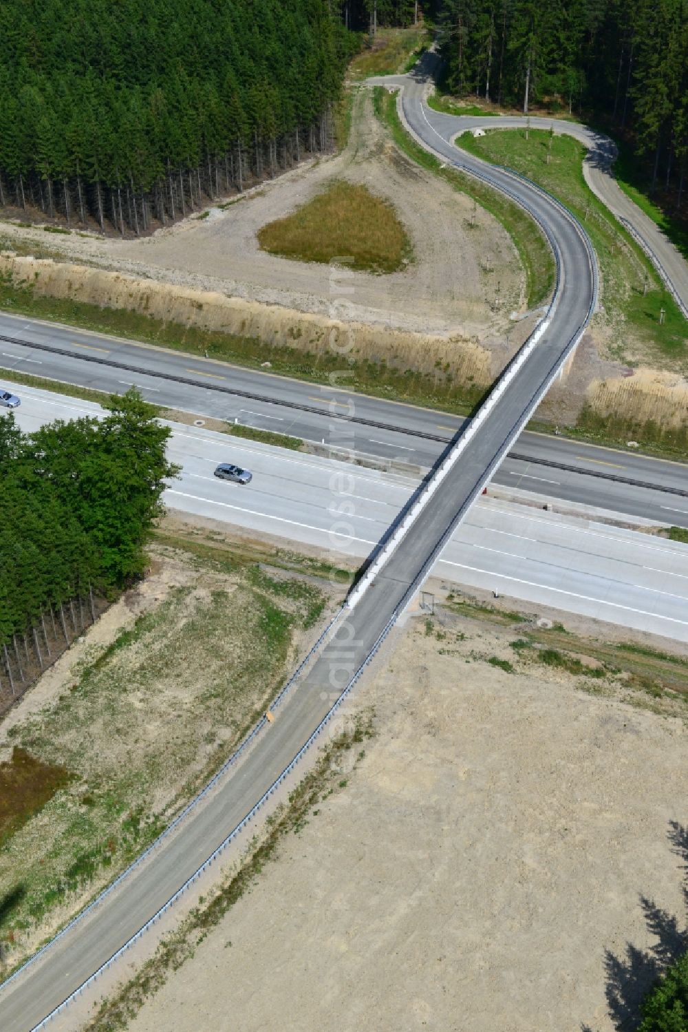 Aerial photograph Dittersdorf - Buildings and route of the motorway A9 motorway with four lanes now. Currently, reconstruction, expansion and new construction work is underway for the six-lane expansion of Highway 9 between Triptis and Schleiz by Wayss & Freytag Ingenieurbau and EUROVIA VINCI