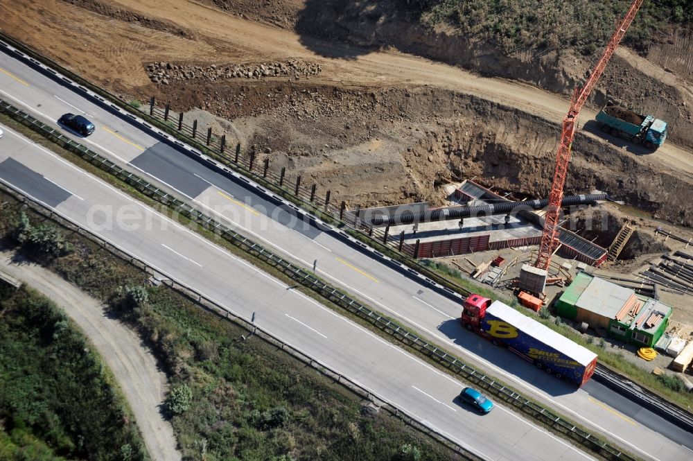 Aerial photograph Görkwitz - Buildings and route of the motorway A9 motorway with four lanes now. Currently, reconstruction, expansion and new construction work is underway for the six-lane expansion of Highway 9 between Triptis and Schleiz by Wayss & Freytag Ingenieurbau and EUROVIA VINCI in Thuringia