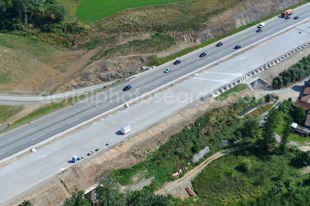 Görkwitz from above - Buildings and route of the motorway A9 motorway with four lanes now. Currently, reconstruction, expansion and new construction work is underway for the six-lane expansion of Highway 9 between Triptis and Schleiz by Wayss & Freytag Ingenieurbau and EUROVIA VINCI in Thuringia