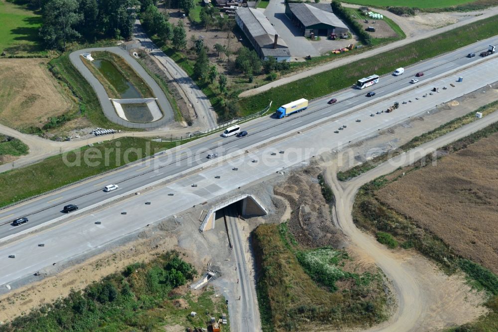 Görkwitz from above - Buildings and route of the motorway A9 motorway with four lanes now. Currently, reconstruction, expansion and new construction work is underway for the six-lane expansion of Highway 9 between Triptis and Schleiz by Wayss & Freytag Ingenieurbau and EUROVIA VINCI in Thuringia