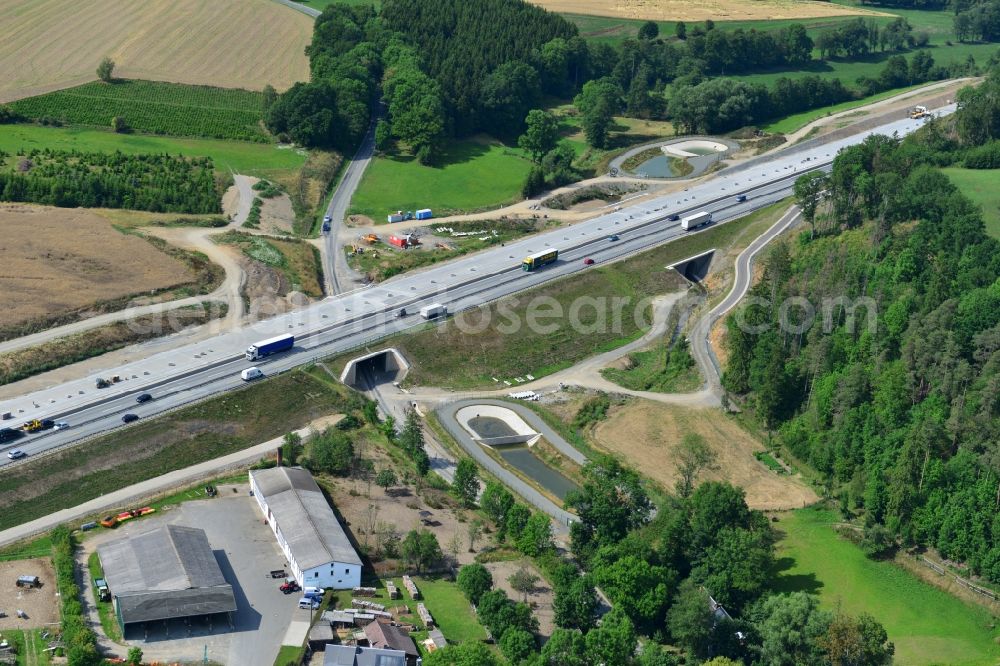 Görkwitz from above - Buildings and route of the motorway A9 motorway with four lanes now. Currently, reconstruction, expansion and new construction work is underway for the six-lane expansion of Highway 9 between Triptis and Schleiz by Wayss & Freytag Ingenieurbau and EUROVIA VINCI in Thuringia