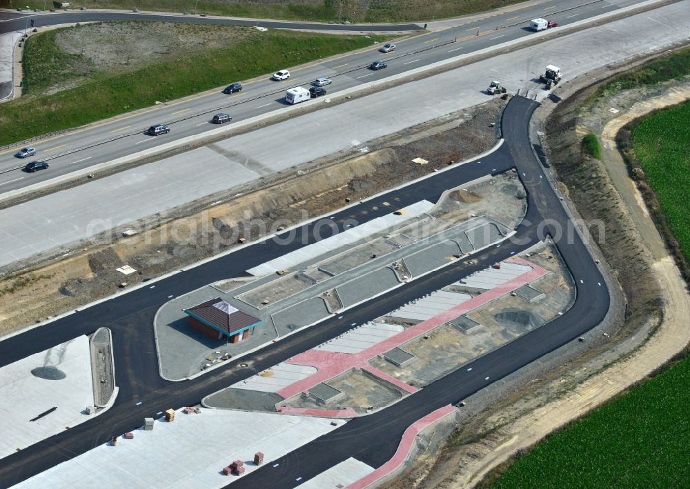 Görkwitz from above - Buildings and route of the motorway A9 motorway with four lanes now. Currently, reconstruction, expansion and new construction work is underway for the six-lane expansion of Highway 9 between Triptis and Schleiz by Wayss & Freytag Ingenieurbau and EUROVIA VINCI in Thuringia