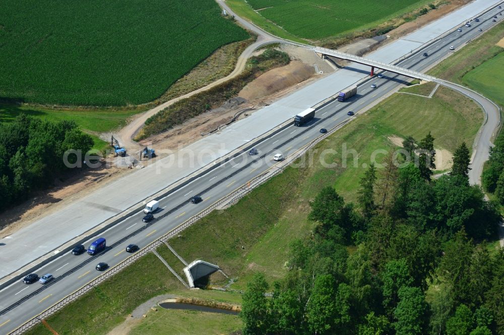 Görkwitz from above - Buildings and route of the motorway A9 motorway with four lanes now. Currently, reconstruction, expansion and new construction work is underway for the six-lane expansion of Highway 9 between Triptis and Schleiz by Wayss & Freytag Ingenieurbau and EUROVIA VINCI in Thuringia