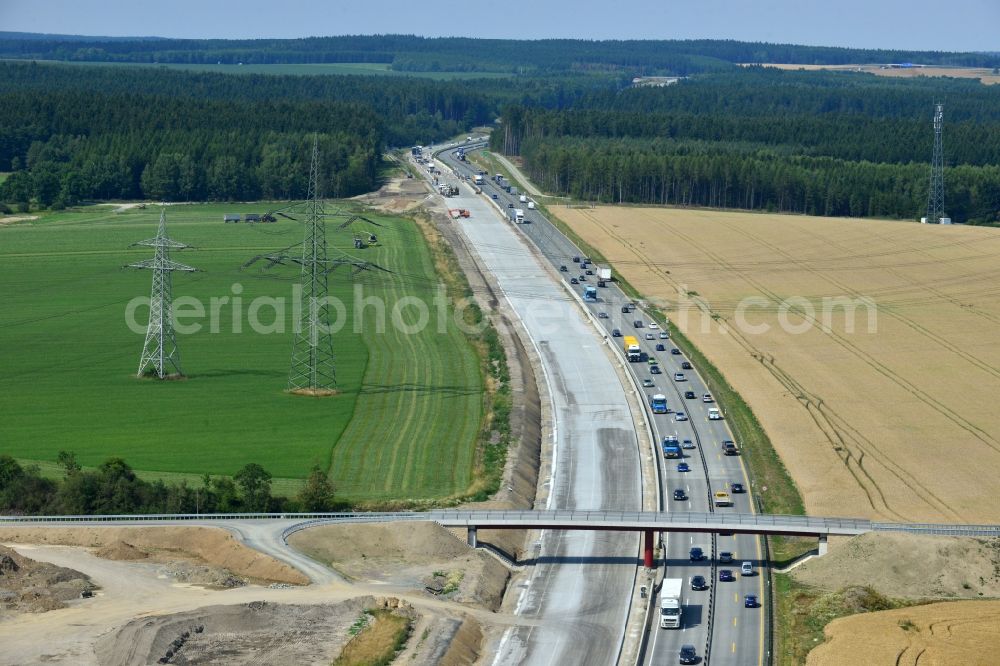 Görkwitz from above - Buildings and route of the motorway A9 motorway with four lanes now. Currently, reconstruction, expansion and new construction work is underway for the six-lane expansion of Highway 9 between Triptis and Schleiz by Wayss & Freytag Ingenieurbau and EUROVIA VINCI in Thuringia