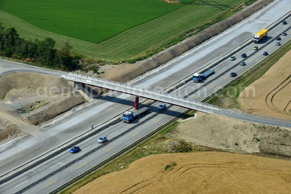 Aerial photograph Görkwitz - Buildings and route of the motorway A9 motorway with four lanes now. Currently, reconstruction, expansion and new construction work is underway for the six-lane expansion of Highway 9 between Triptis and Schleiz by Wayss & Freytag Ingenieurbau and EUROVIA VINCI in Thuringia