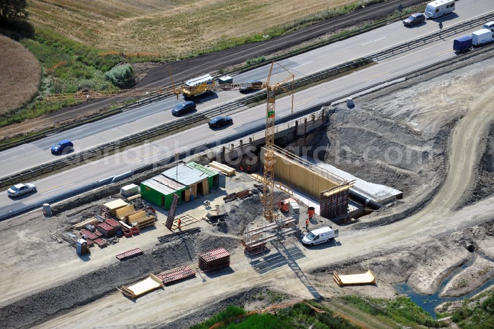 Köthnitz from above - Buildings and route of the motorway A9 motorway with four lanes now. Currently, reconstruction, expansion and new construction work is underway for the six-lane expansion of Highway 9 between Triptis and Schleiz by Wayss & Freytag Ingenieurbau and EUROVIA VINCI in Thuringia