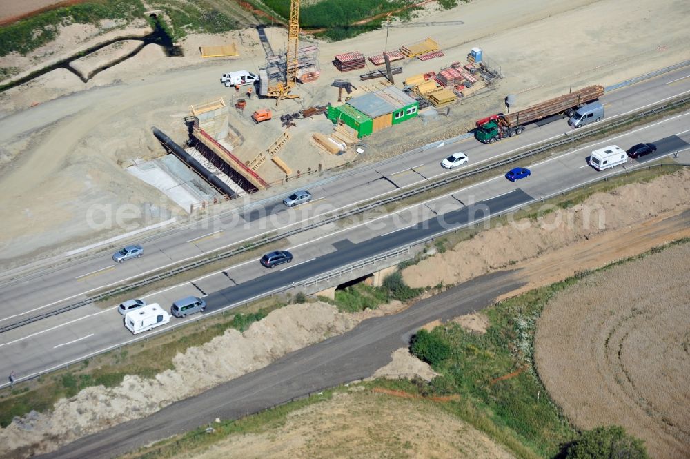 Köthnitz from above - Buildings and route of the motorway A9 motorway with four lanes now. Currently, reconstruction, expansion and new construction work is underway for the six-lane expansion of Highway 9 between Triptis and Schleiz by Wayss & Freytag Ingenieurbau and EUROVIA VINCI in Thuringia