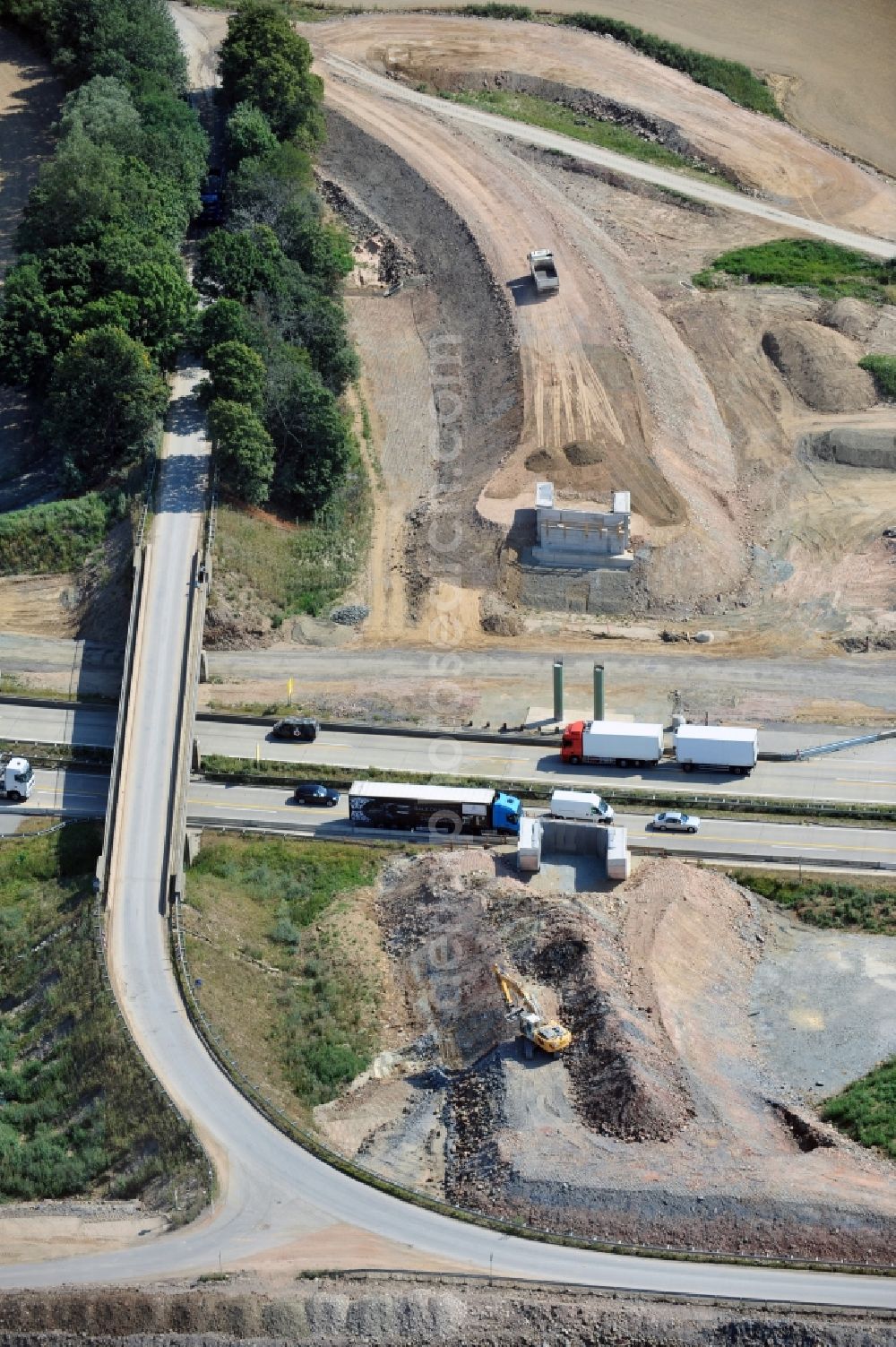 Aerial photograph Lemnitz - Buildings and route of the motorway A9 motorway with four lanes now. Currently, reconstruction, expansion and new construction work is underway for the six-lane expansion of Highway 9 between Triptis and Schleiz by Wayss & Freytag Ingenieurbau and EUROVIA VINCI in Thuringia