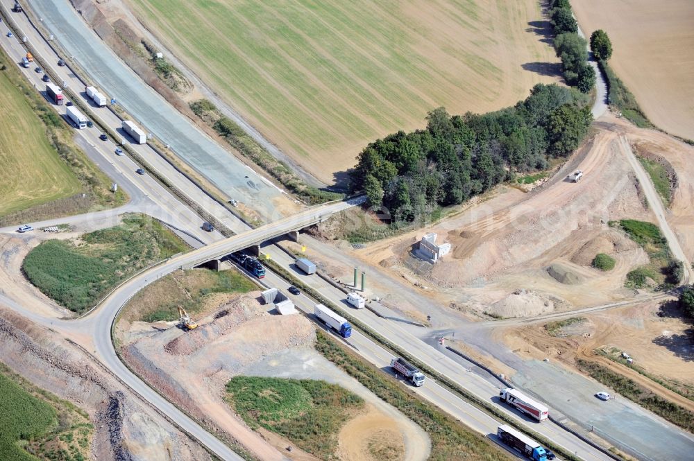 Lemnitz from above - Buildings and route of the motorway A9 motorway with four lanes now. Currently, reconstruction, expansion and new construction work is underway for the six-lane expansion of Highway 9 between Triptis and Schleiz by Wayss & Freytag Ingenieurbau and EUROVIA VINCI in Thuringia