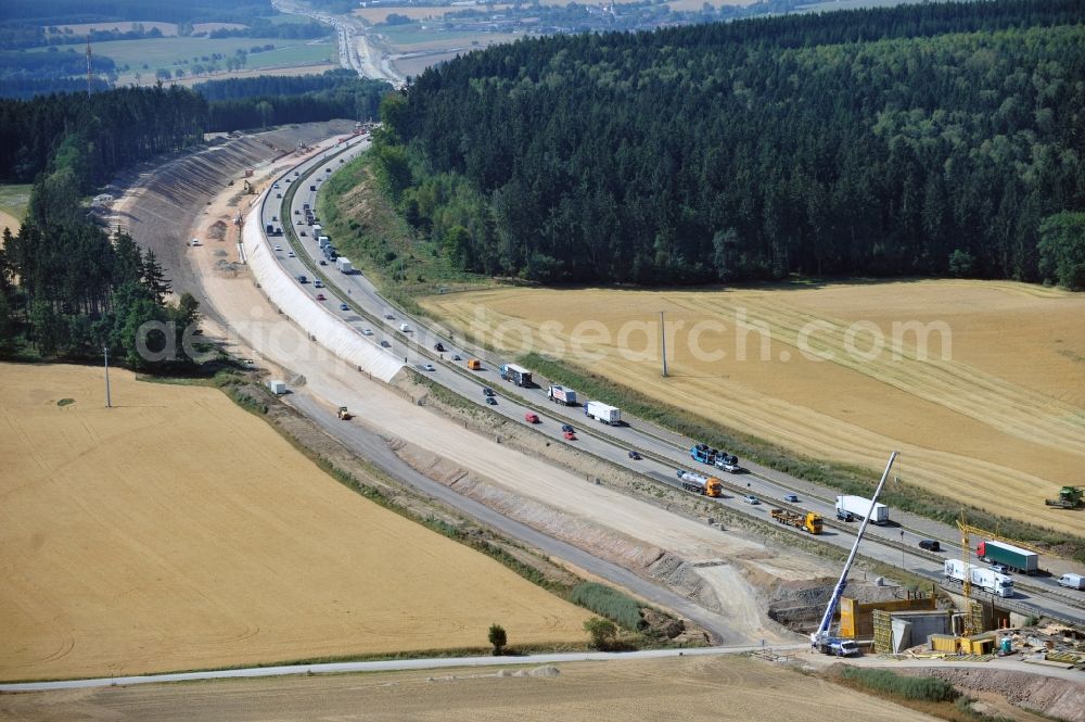 Aerial photograph Lemnitz - Buildings and route of the motorway A9 motorway with four lanes now. Currently, reconstruction, expansion and new construction work is underway for the six-lane expansion of Highway 9 between Triptis and Schleiz by Wayss & Freytag Ingenieurbau and EUROVIA VINCI in Thuringia