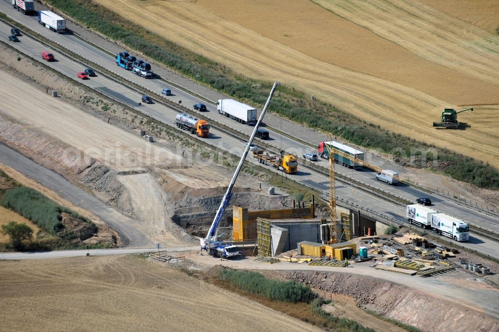 Lemnitz from above - Buildings and route of the motorway A9 motorway with four lanes now. Currently, reconstruction, expansion and new construction work is underway for the six-lane expansion of Highway 9 between Triptis and Schleiz by Wayss & Freytag Ingenieurbau and EUROVIA VINCI in Thuringia