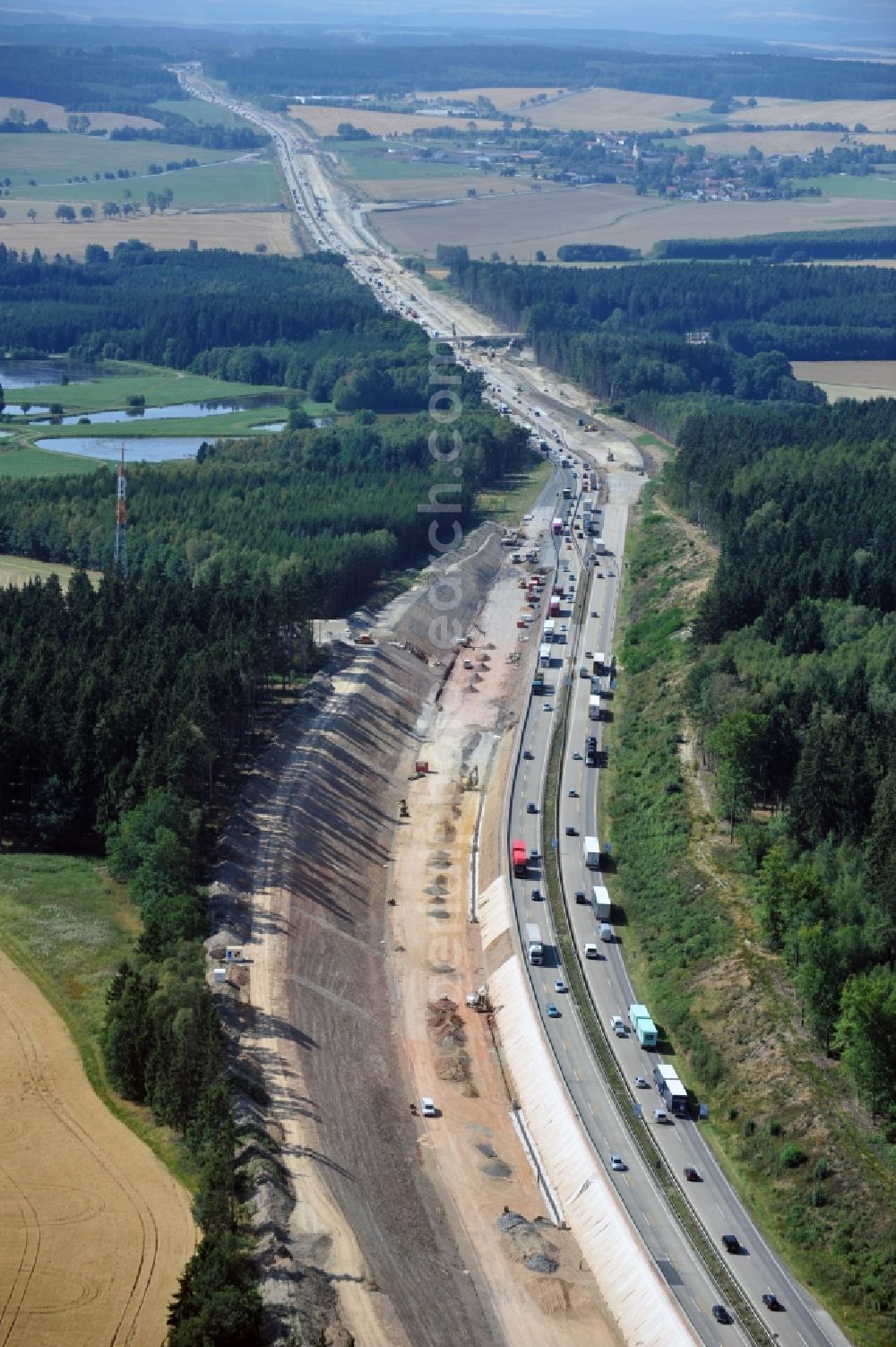 Aerial photograph Lemnitz - Buildings and route of the motorway A9 motorway with four lanes now. Currently, reconstruction, expansion and new construction work is underway for the six-lane expansion of Highway 9 between Triptis and Schleiz by Wayss & Freytag Ingenieurbau and EUROVIA VINCI in Thuringia