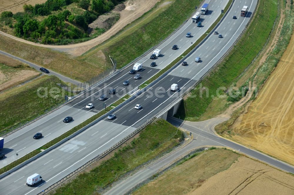 Aerial photograph Lemnitz - Buildings and route of the motorway A9 motorway with four lanes now. Currently, reconstruction, expansion and new construction work is underway for the six-lane expansion of Highway 9 between Triptis and Schleiz by Wayss & Freytag Ingenieurbau and EUROVIA VINCI in Thuringia