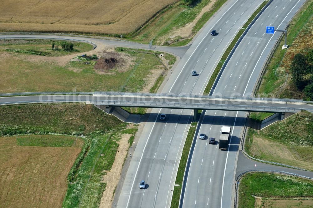 Lemnitz from above - Buildings and route of the motorway A9 motorway with four lanes now. Currently, reconstruction, expansion and new construction work is underway for the six-lane expansion of Highway 9 between Triptis and Schleiz by Wayss & Freytag Ingenieurbau and EUROVIA VINCI in Thuringia