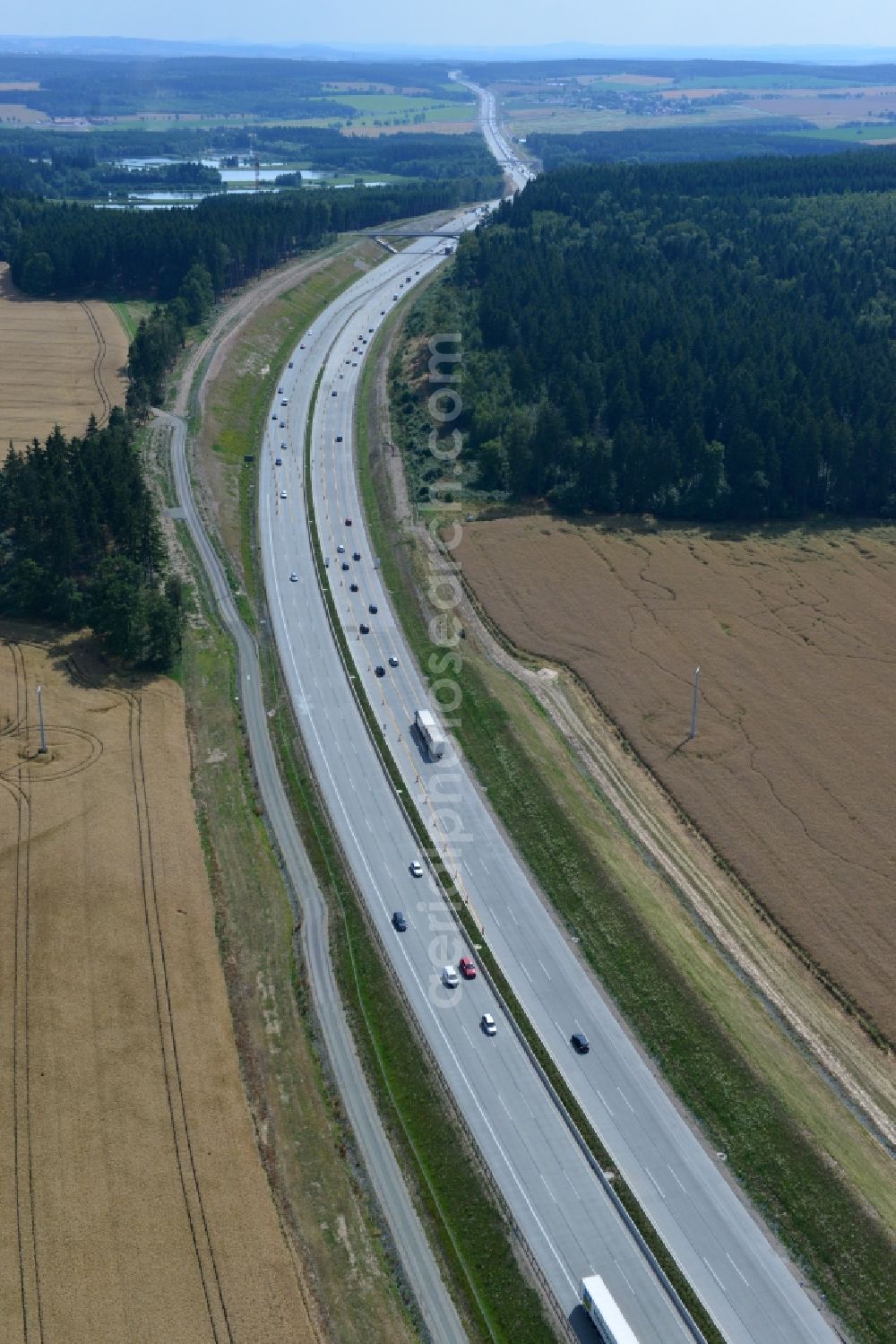 Aerial photograph Lemnitz - Buildings and route of the motorway A9 motorway with four lanes now. Currently, reconstruction, expansion and new construction work is underway for the six-lane expansion of Highway 9 between Triptis and Schleiz by Wayss & Freytag Ingenieurbau and EUROVIA VINCI in Thuringia