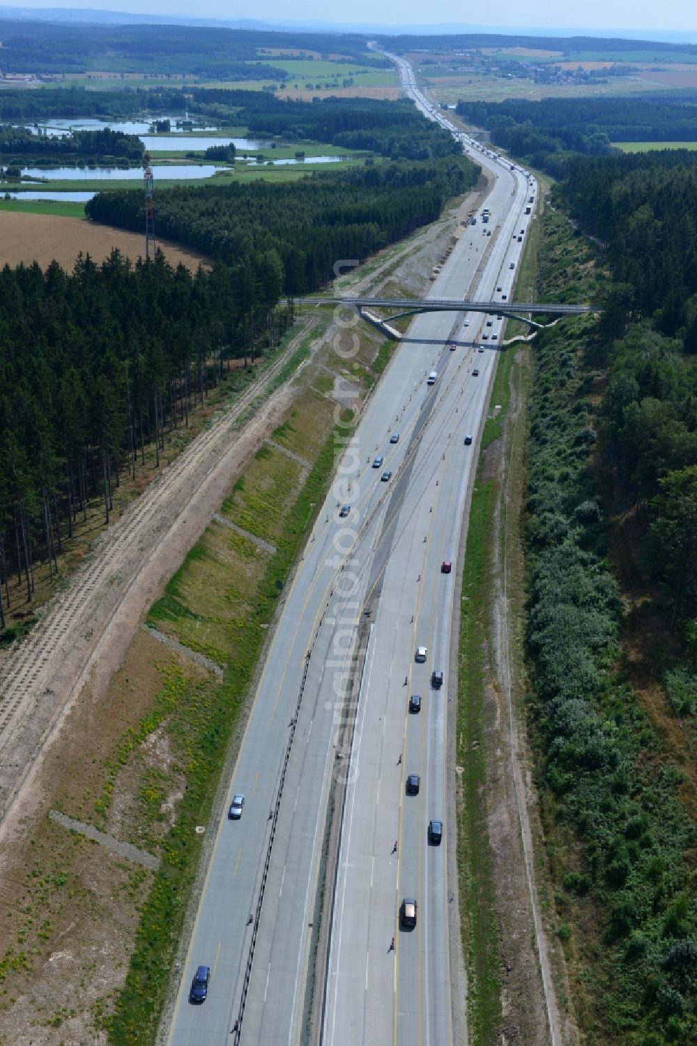 Lemnitz from above - Buildings and route of the motorway A9 motorway with four lanes now. Currently, reconstruction, expansion and new construction work is underway for the six-lane expansion of Highway 9 between Triptis and Schleiz by Wayss & Freytag Ingenieurbau and EUROVIA VINCI in Thuringia