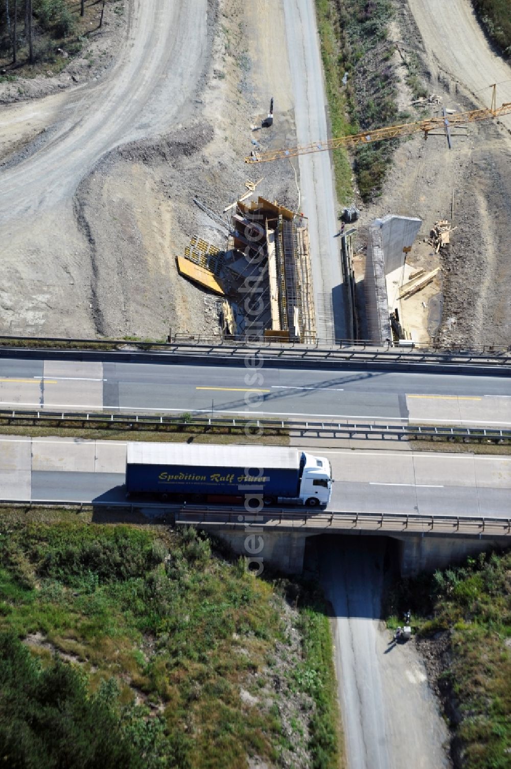 Aerial image Pahnstangen - Ausbau- Arbeiten und Baustellen an der Streckenführung der BAB Bundesautobahn A9 bei Pahnstangen in Thüringen. Derzeit laufen Umbau-, Erweiterungs- und Neubauarbeiten für den sechsspurigen Ausbau der Autobahn 9 zwischen Triptis und Schleiz in Thüringen durch die Arbeitsgemeinschaft ARGE Wayss