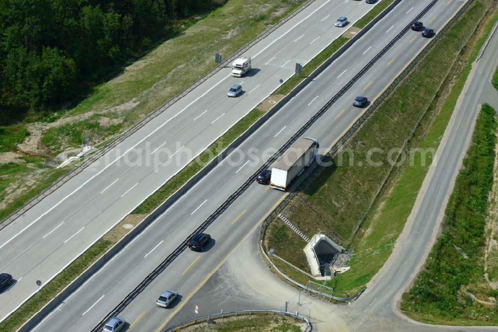 Pörmitz from the bird's eye view: Buildings and route of the motorway A9 motorway with four lanes now. Currently, reconstruction, expansion and new construction work is underway for the six-lane expansion of Highway 9 near Poermitz by Wayss & Freytag Ingenieurbau and EUROVIA VINCI in Thuringia