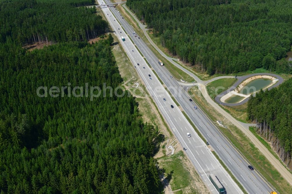 Pörmitz from above - Buildings and route of the motorway A9 motorway with four lanes now. Currently, reconstruction, expansion and new construction work is underway for the six-lane expansion of Highway 9 near Poermitz by Wayss & Freytag Ingenieurbau and EUROVIA VINCI in Thuringia