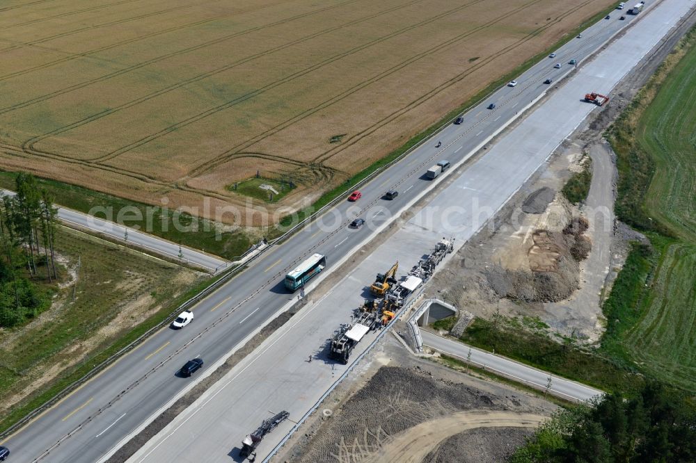 Pörmitz from above - Buildings and route of the motorway A9 motorway with four lanes now. Currently, reconstruction, expansion and new construction work is underway for the six-lane expansion of Highway 9 near Poermitz by Wayss & Freytag Ingenieurbau and EUROVIA VINCI in Thuringia