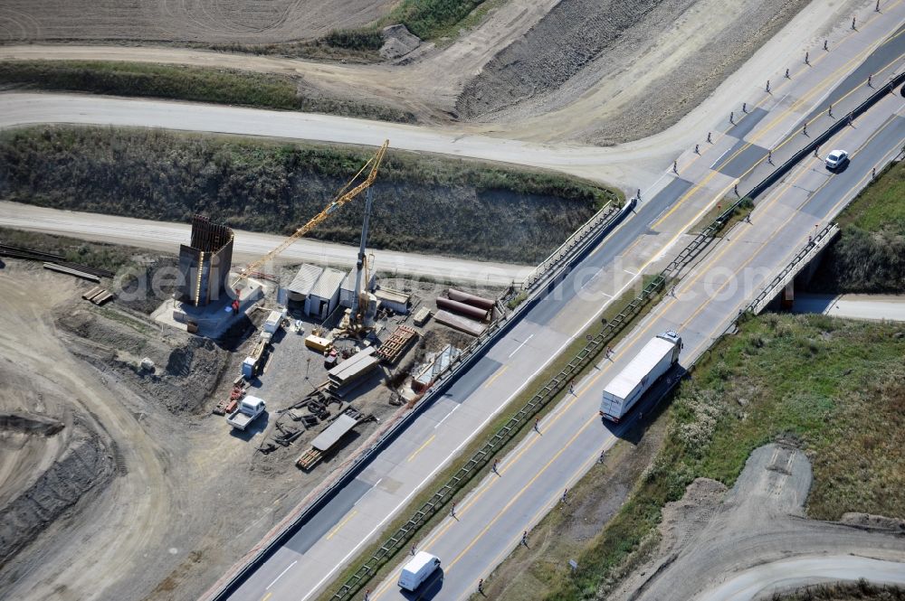 Aerial photograph Schleiz - Buildings and route of the motorway A9 motorway with four lanes now. Currently, reconstruction, expansion and new construction work is underway for the six-lane expansion of Highway 9 between Triptis and Schleiz by Wayss & Freytag Ingenieurbau and EUROVIA VINCI in Thuringia