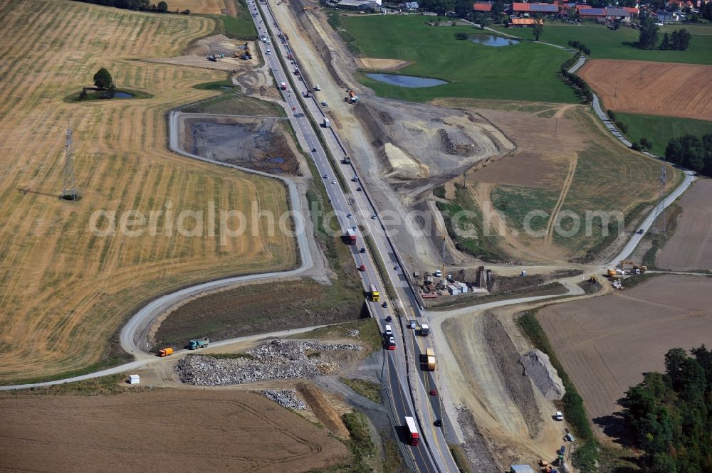 Aerial photograph Schleiz - Buildings and route of the motorway A9 motorway with four lanes now. Currently, reconstruction, expansion and new construction work is underway for the six-lane expansion of Highway 9 between Triptis and Schleiz by Wayss & Freytag Ingenieurbau and EUROVIA VINCI in Thuringia